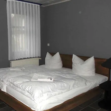 Quarto em Acomodações Particulares Reetdachhaus 